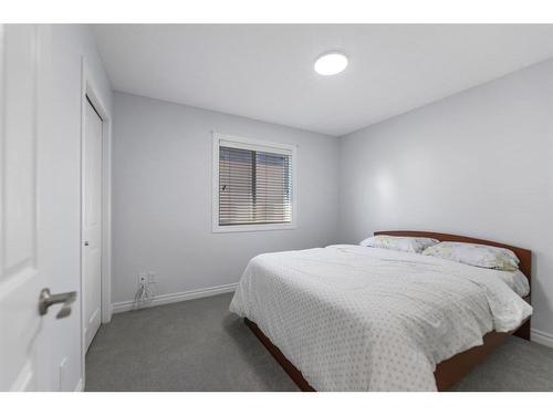 261 Bridleridge View Sw, Calgary, AB - Indoor Photo Showing Bedroom