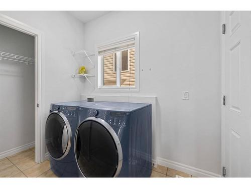 261 Bridleridge View Sw, Calgary, AB - Indoor Photo Showing Laundry Room