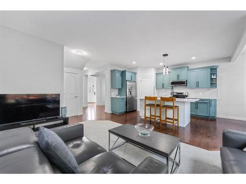 261 Bridleridge View Sw, Calgary, AB - Indoor Photo Showing Living Room