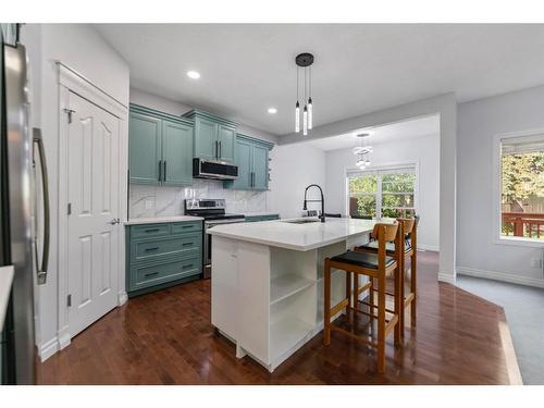 261 Bridleridge View Sw, Calgary, AB - Indoor Photo Showing Kitchen With Upgraded Kitchen