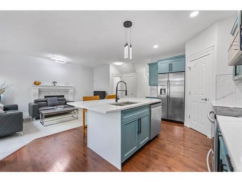 261 Bridleridge View Sw, Calgary, AB - Indoor Photo Showing Kitchen With Double Sink