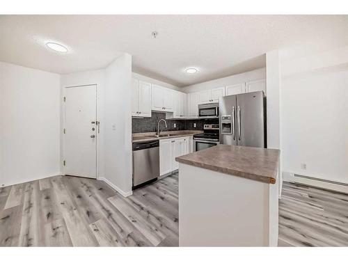 207-3000 Citadel Meadow Point Nw, Calgary, AB - Indoor Photo Showing Kitchen With Stainless Steel Kitchen With Double Sink