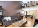 179 Scenic Park Crescent Nw, Calgary, AB  - Indoor Photo Showing Living Room 