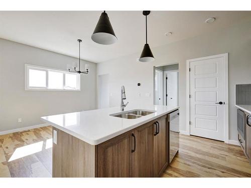 3238 Chinook Winds Drive Sw, Airdrie, AB - Indoor Photo Showing Kitchen With Double Sink