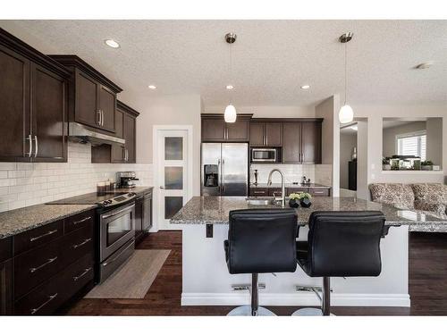 87 Silverado Skies Drive Sw, Calgary, AB - Indoor Photo Showing Kitchen With Upgraded Kitchen