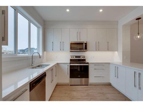 477 Dawson Circle, Chestermere, AB - Indoor Photo Showing Kitchen With Double Sink