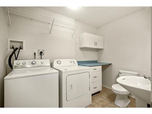 296 Mt Aberdeen Close Se, Calgary, AB - Indoor Photo Showing Laundry Room