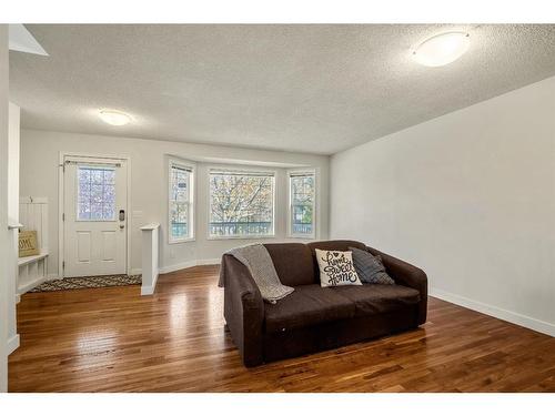 296 Mt Aberdeen Close Se, Calgary, AB - Indoor Photo Showing Living Room