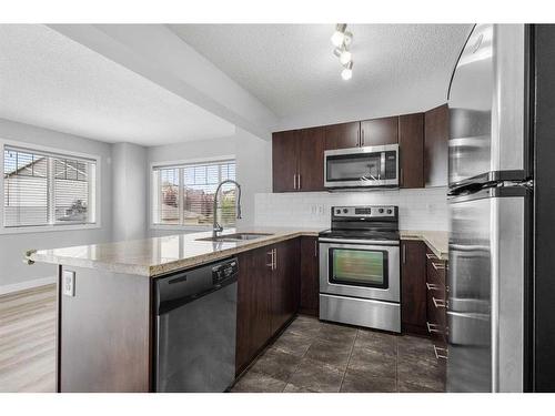 167 Pantego Lane Nw, Calgary, AB - Indoor Photo Showing Kitchen With Upgraded Kitchen