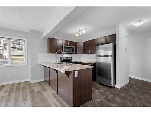 167 Pantego Lane Nw, Calgary, AB - Indoor Photo Showing Kitchen With Upgraded Kitchen