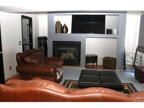 167 Covington Close Ne, Calgary, AB - Indoor Photo Showing Living Room With Fireplace