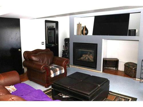 167 Covington Close Ne, Calgary, AB - Indoor Photo Showing Living Room With Fireplace