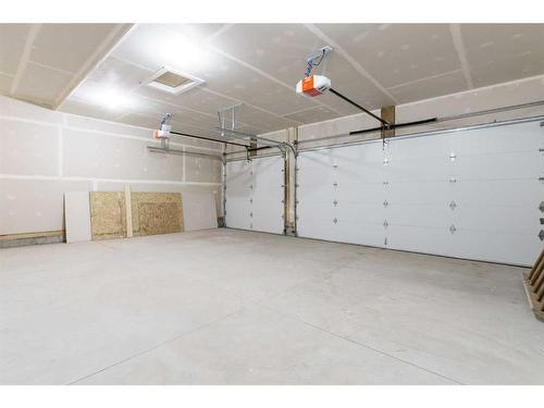 710 Mandalay Boulevard, Carstairs, AB - Indoor Photo Showing Garage