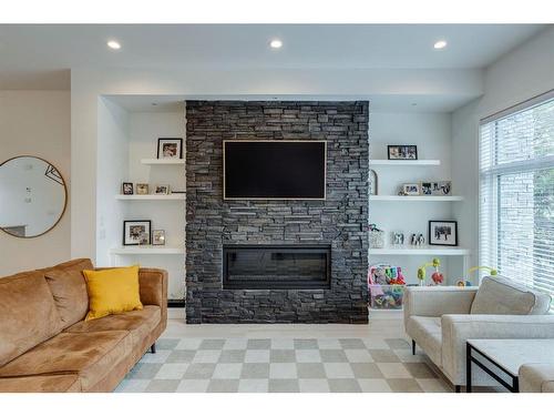 2407 28 Avenue Sw, Calgary, AB - Indoor Photo Showing Living Room With Fireplace