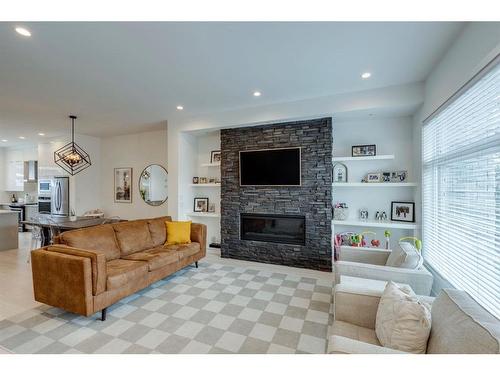 2407 28 Avenue Sw, Calgary, AB - Indoor Photo Showing Living Room With Fireplace