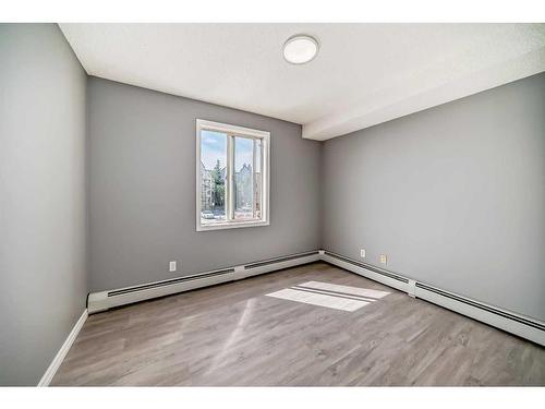 218-3000 Somervale Court Sw, Calgary, AB - Indoor Photo Showing Other Room