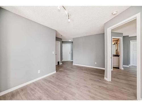 218-3000 Somervale Court Sw, Calgary, AB - Indoor Photo Showing Other Room