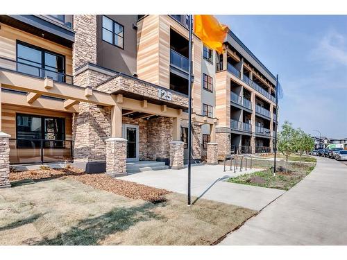 317-125 Wolf Hollow Crescent Se, Calgary, AB - Outdoor With Balcony With Facade