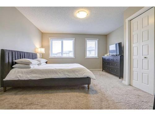 408-50 Westland Road, Okotoks, AB - Indoor Photo Showing Bedroom