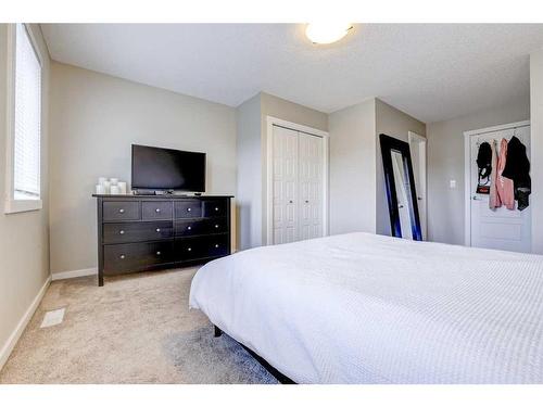 408-50 Westland Road, Okotoks, AB - Indoor Photo Showing Bedroom