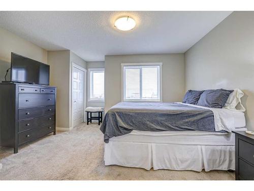 408-50 Westland Road, Okotoks, AB - Indoor Photo Showing Bedroom