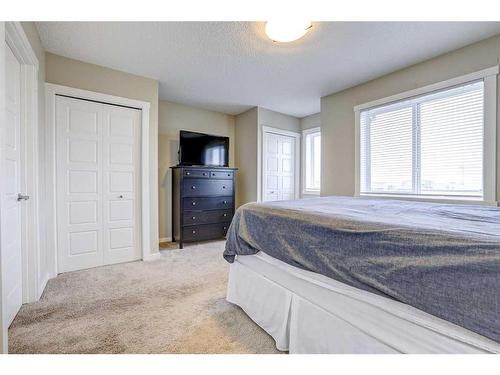 408-50 Westland Road, Okotoks, AB - Indoor Photo Showing Bedroom