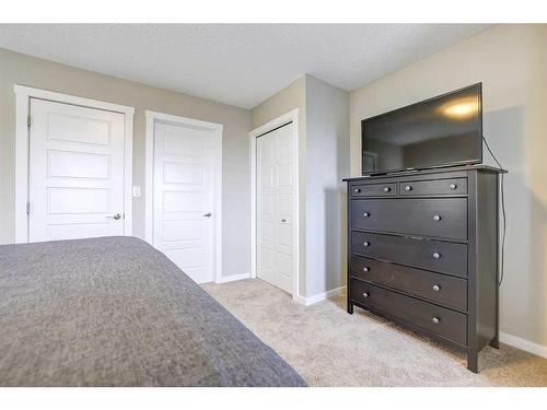 408-50 Westland Road, Okotoks, AB - Indoor Photo Showing Bedroom