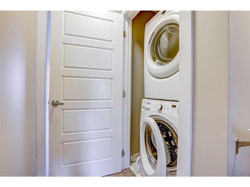 408-50 Westland Road, Okotoks, AB - Indoor Photo Showing Laundry Room