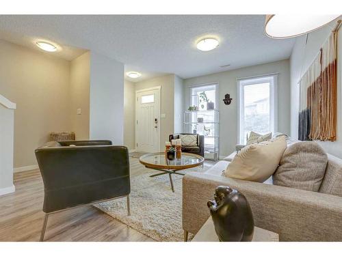 408-50 Westland Road, Okotoks, AB - Indoor Photo Showing Living Room