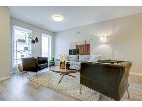 408-50 Westland Road, Okotoks, AB - Indoor Photo Showing Living Room