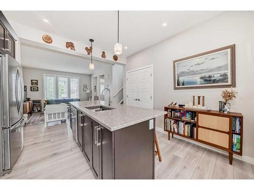 47 Belmont Gardens Sw, Calgary, AB - Indoor Photo Showing Kitchen With Double Sink With Upgraded Kitchen