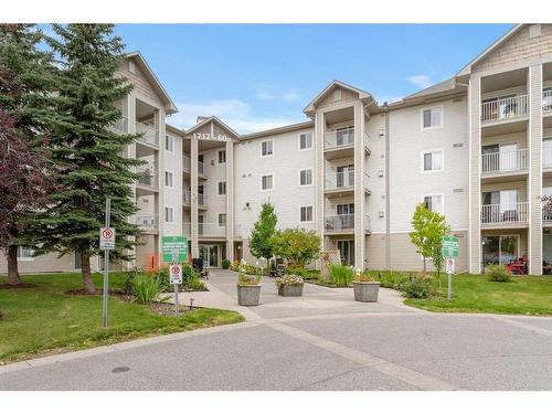 301-1717 60 Street Se, Calgary, AB - Outdoor With Balcony With Facade