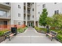 301-1717 60 Street Se, Calgary, AB  - Outdoor With Balcony With Facade 