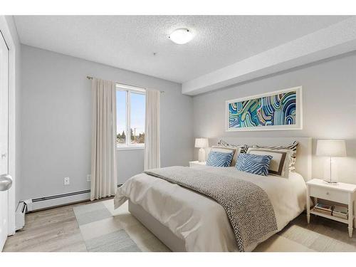 301-1717 60 Street Se, Calgary, AB - Indoor Photo Showing Bedroom