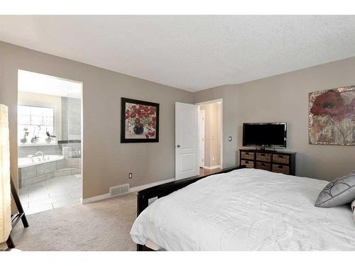 323 Sierra Nevada Place Sw, Calgary, AB - Indoor Photo Showing Bedroom