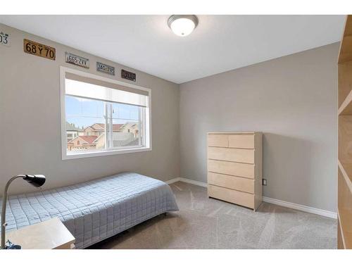 323 Sierra Nevada Place Sw, Calgary, AB - Indoor Photo Showing Bedroom