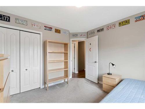 323 Sierra Nevada Place Sw, Calgary, AB - Indoor Photo Showing Bedroom