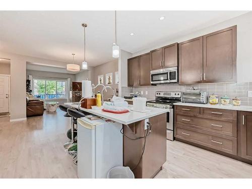 9 Copperpond Avenue Se, Calgary, AB - Indoor Photo Showing Kitchen With Upgraded Kitchen