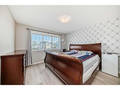 9 Copperpond Avenue Se, Calgary, AB - Indoor Photo Showing Bedroom