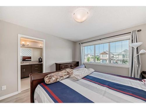 9 Copperpond Avenue Se, Calgary, AB - Indoor Photo Showing Bedroom