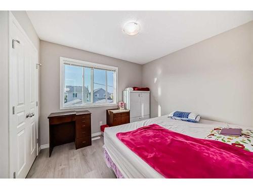 9 Copperpond Avenue Se, Calgary, AB - Indoor Photo Showing Bedroom