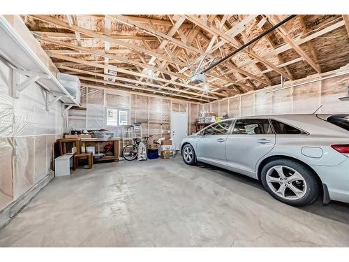 9 Copperpond Avenue Se, Calgary, AB - Indoor Photo Showing Garage