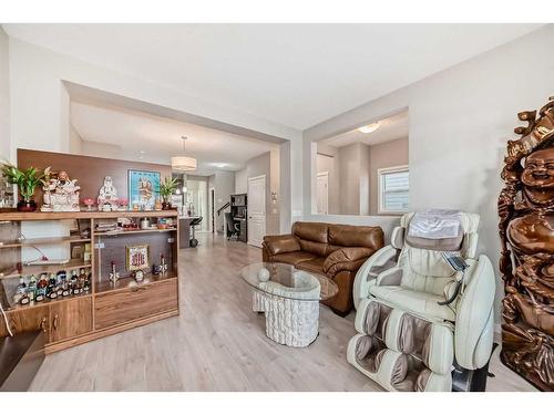 9 Copperpond Avenue Se, Calgary, AB - Indoor Photo Showing Living Room