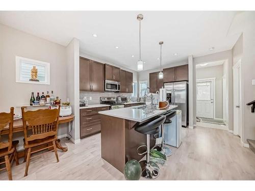 9 Copperpond Avenue Se, Calgary, AB - Indoor Photo Showing Kitchen With Upgraded Kitchen