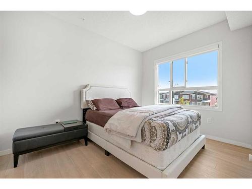 208-40 Carrington Plaza Nw, Calgary, AB - Indoor Photo Showing Bedroom