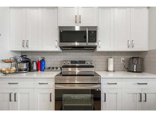 208-40 Carrington Plaza Nw, Calgary, AB - Indoor Photo Showing Kitchen With Upgraded Kitchen