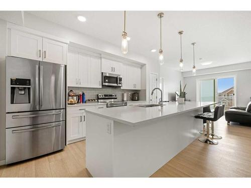 208-40 Carrington Plaza Nw, Calgary, AB - Indoor Photo Showing Kitchen With Upgraded Kitchen