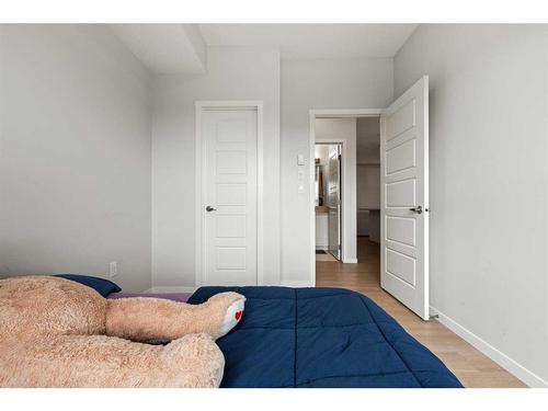 208-40 Carrington Plaza Nw, Calgary, AB - Indoor Photo Showing Bedroom