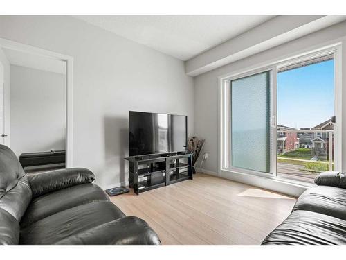 208-40 Carrington Plaza Nw, Calgary, AB - Indoor Photo Showing Living Room