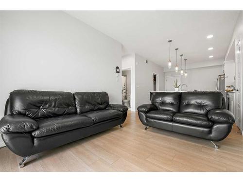 208-40 Carrington Plaza Nw, Calgary, AB - Indoor Photo Showing Living Room